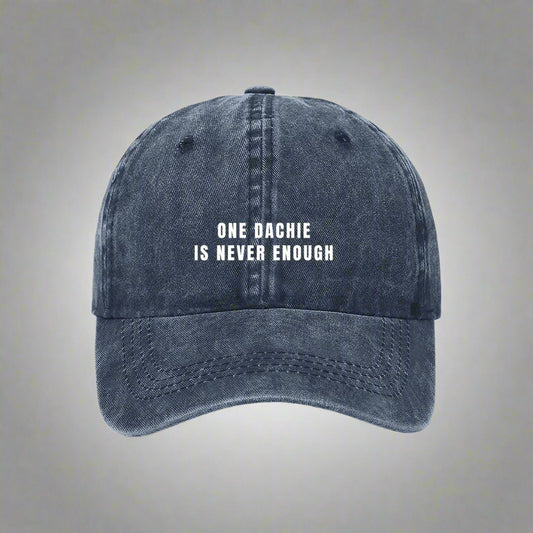A blue denim baseball cap with the text 'ONE DACHIE IS NEVER ENOUGH' printed in white on the front.