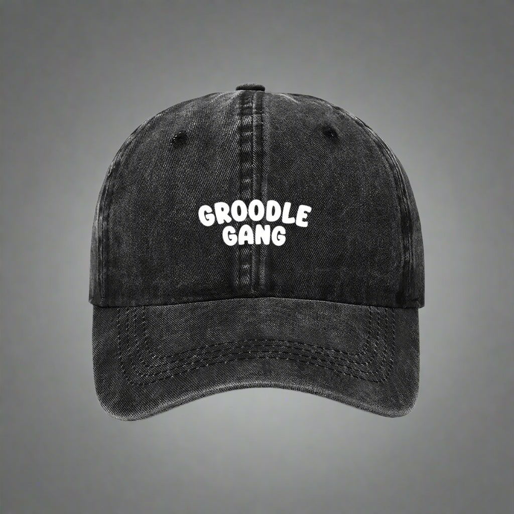 Black cap with 'Groodle Gang' text on a white background