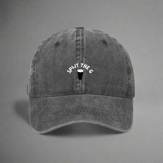 A grey denim cap with 'SPLIT THE G' embroidered on the front.