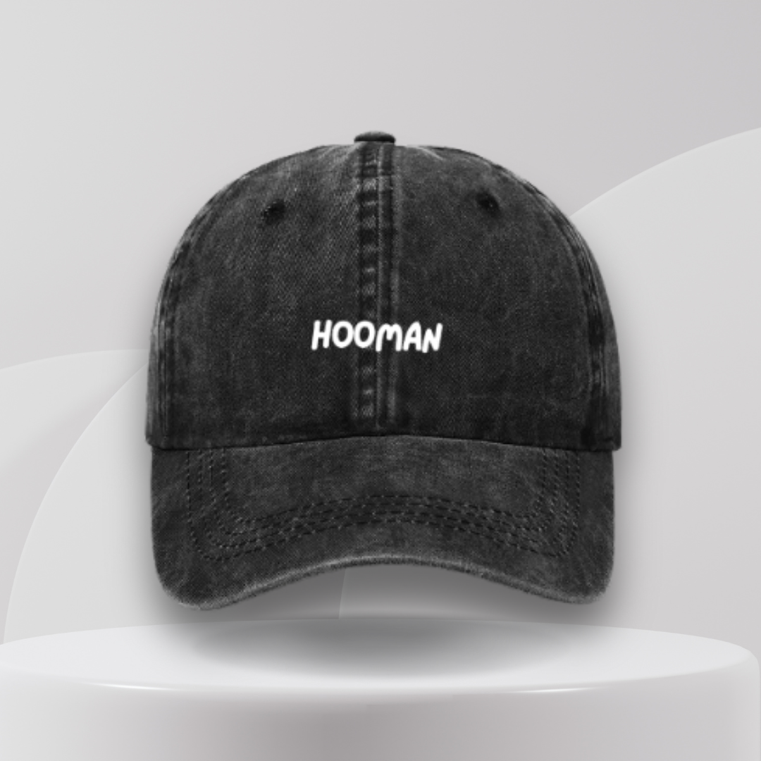 black cap embroidered 'hooman' in white text. a great gift idea for mums and dog mums in australia