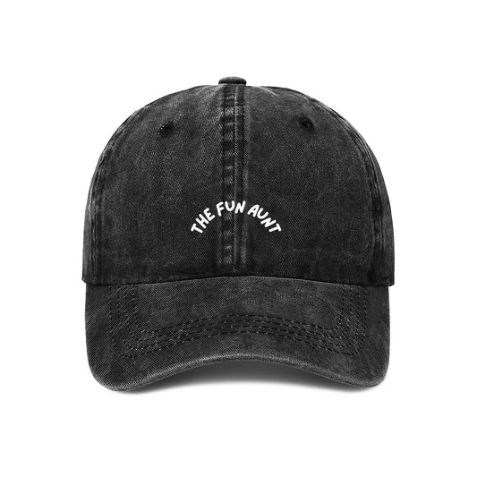 A black denim baseball cap with the text 'THE FUN AUNT' embroidered on the front.