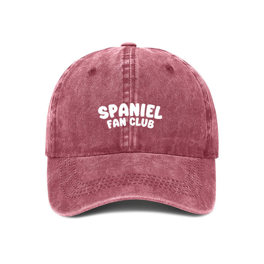 Red cap with 'Spaniel Fan Club' text on a white background