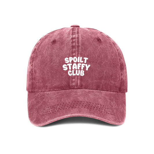 Maroon cap with 'Spoilt Staffy Club' text on a white background