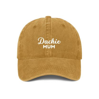 Yellow baseball cap with DACHIE MUM embroidered on the front