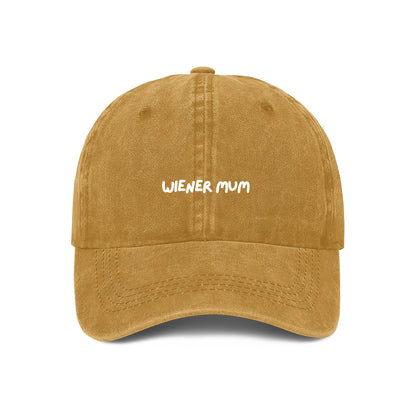yellow baseball cap with 'Wiener Mum' text on it.