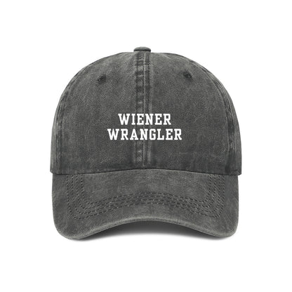 grey denim baseball cap with 'WIENER WRANGLER' text embroidered on the front.