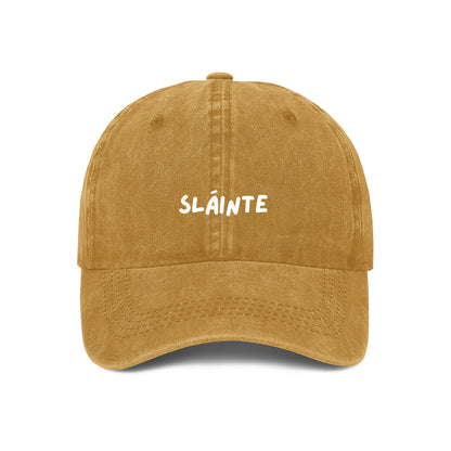 Yellow baseball cap with the word 'Sláinte' embroidered on the front.