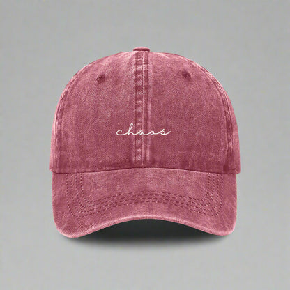 Maroon cap with 'chaos' embroidered on a white background