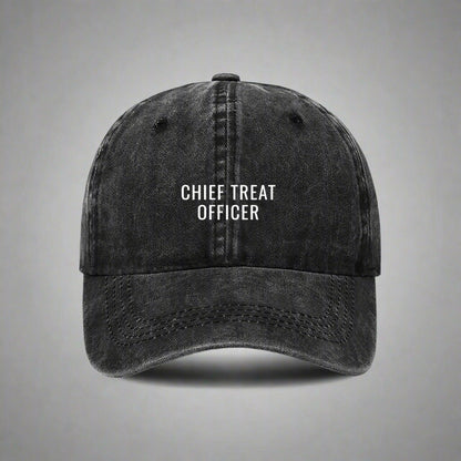 Black cap with 'Chief Treat Officer' text on a gray background