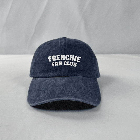 Blue cap with 'FRENCHIE FAN CLUB' text on a light gray background