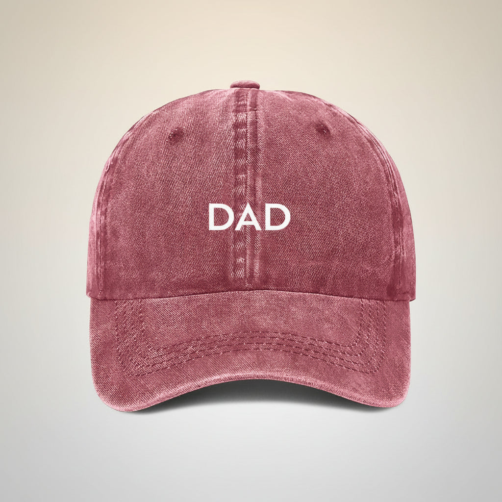 maroon cap with 'DAD' embroidered on a white background
