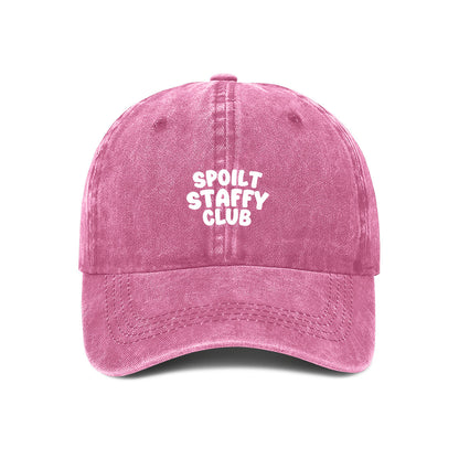 Pink cap with 'Spoilt Staffy Club' text on a white background